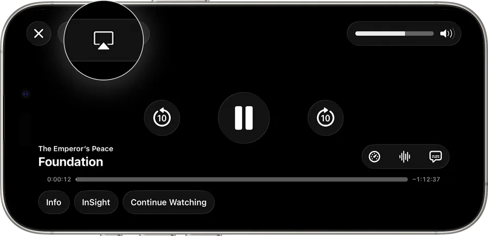 A video open on the iPhone in landscape, with the AirPlay button magnified at the top left.
